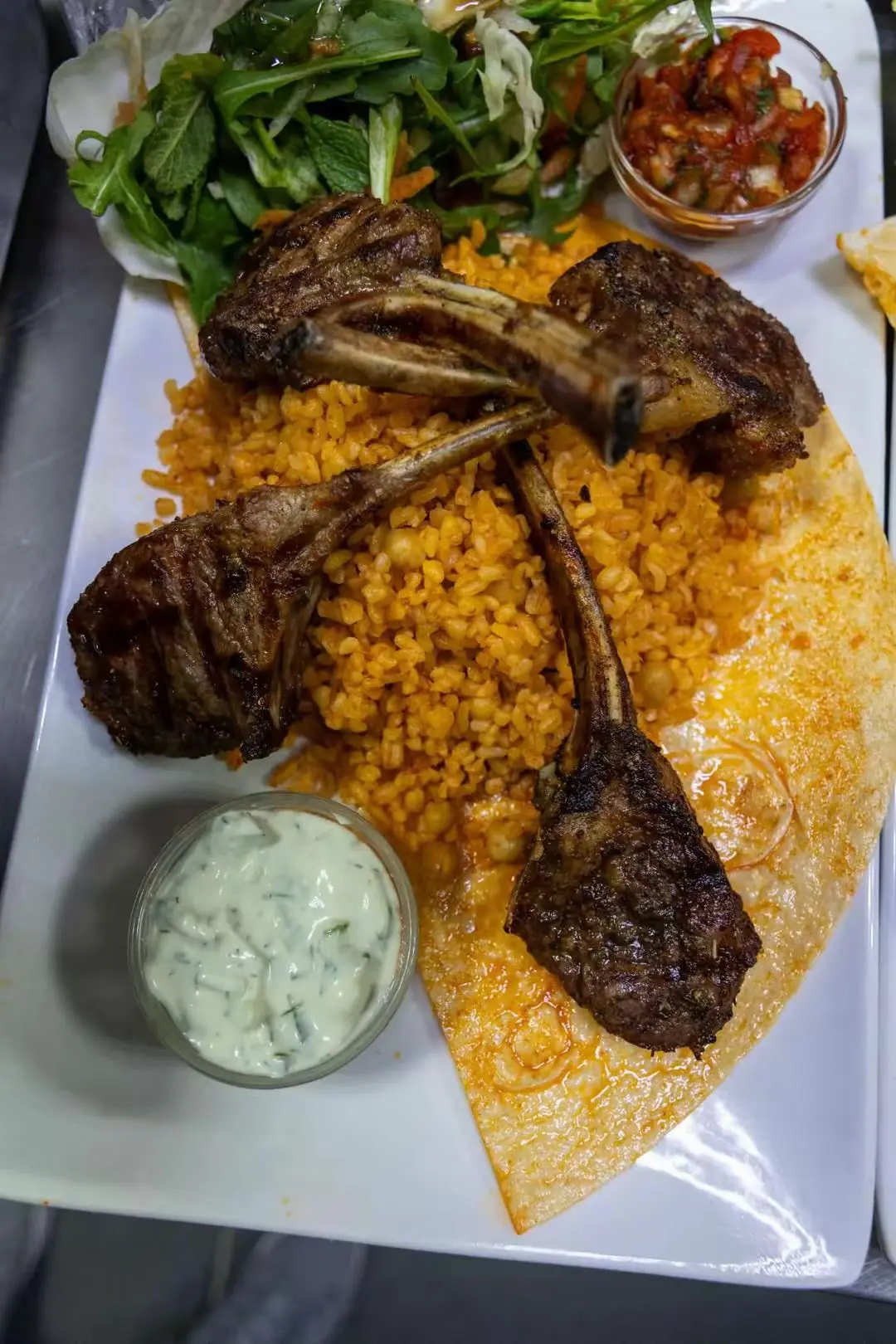 Lamb chops with bulgur and salad