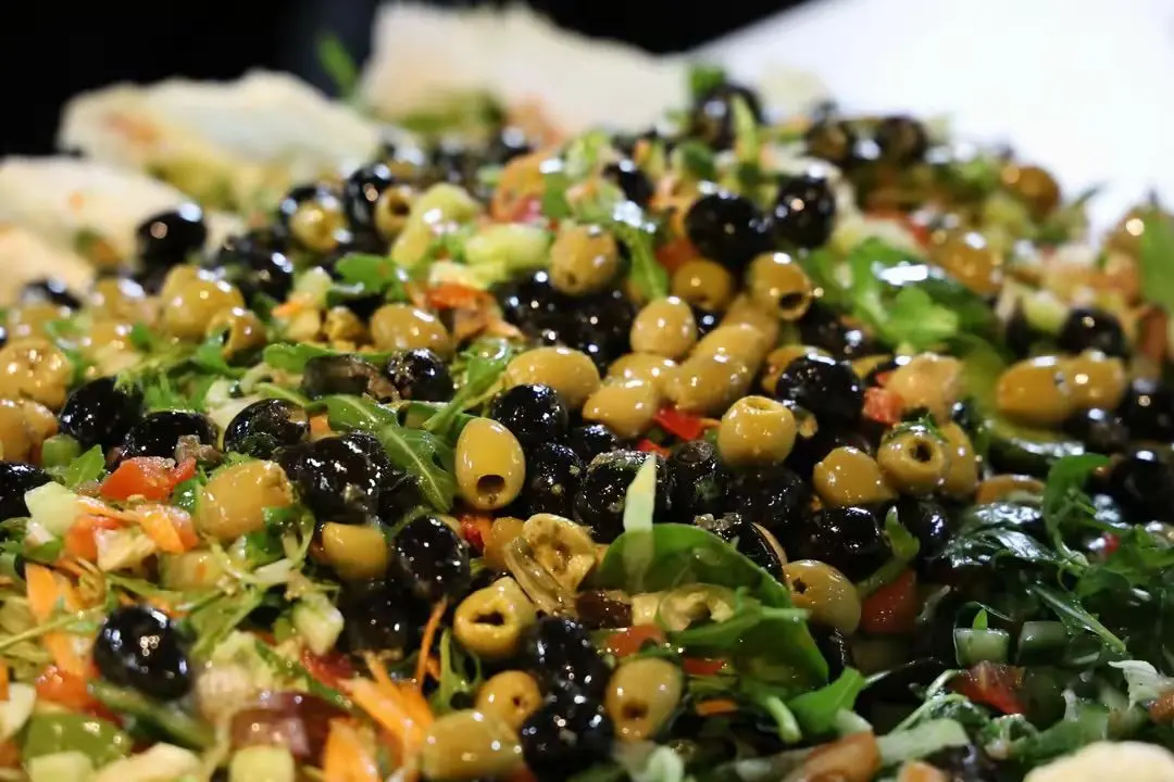 Fresh olive and herb salad