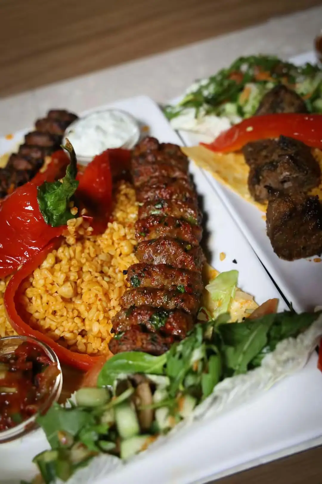 Adana kebab with roasted peppers